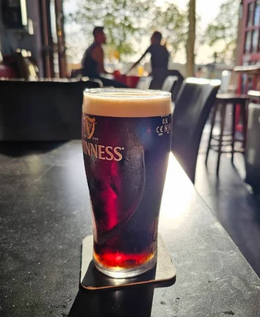 A perfectly poured pint of Guinness with tight cream head at The Fastnet